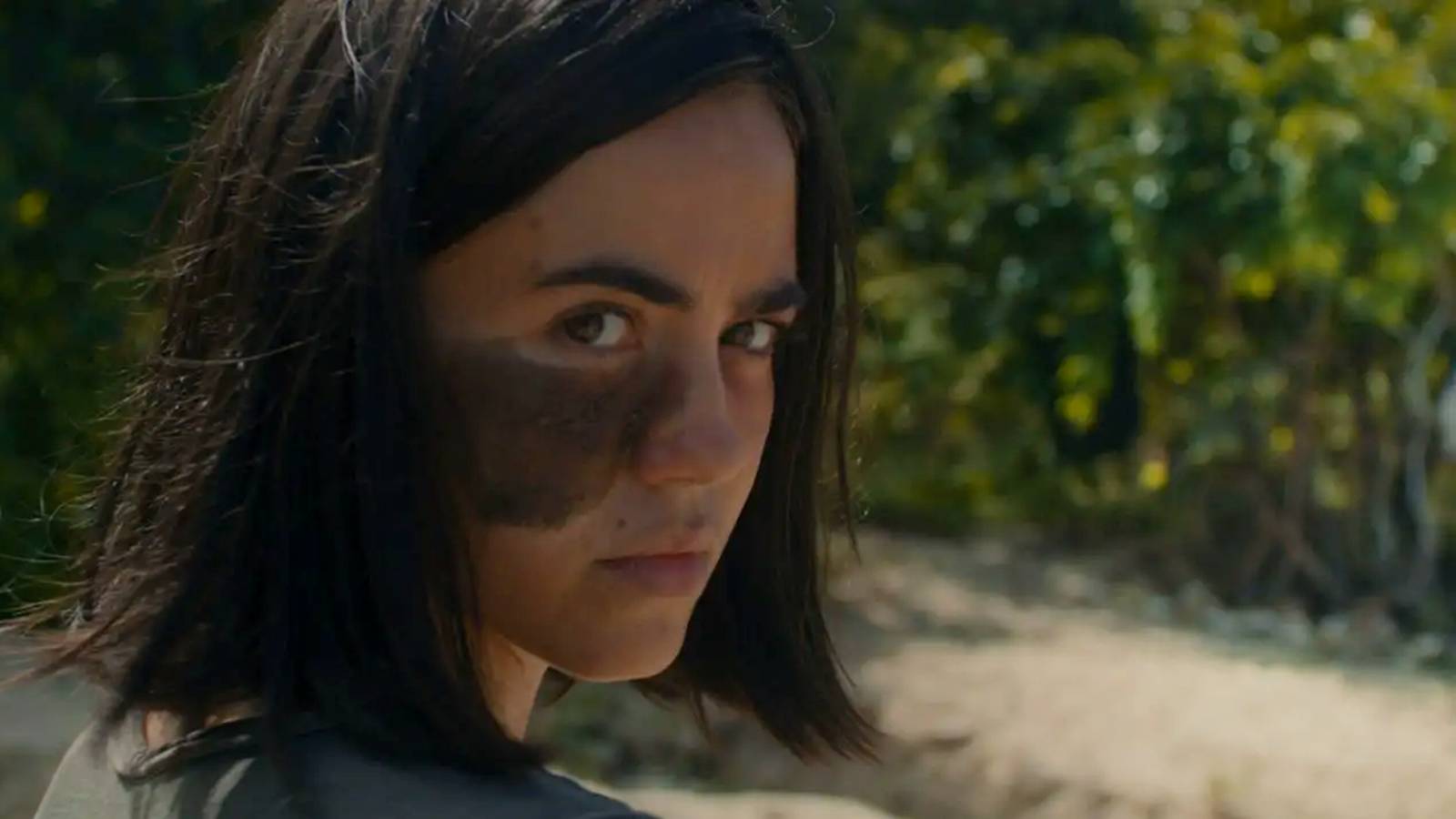 Cassandra Naud looking over her shoulder as CW in Influencer