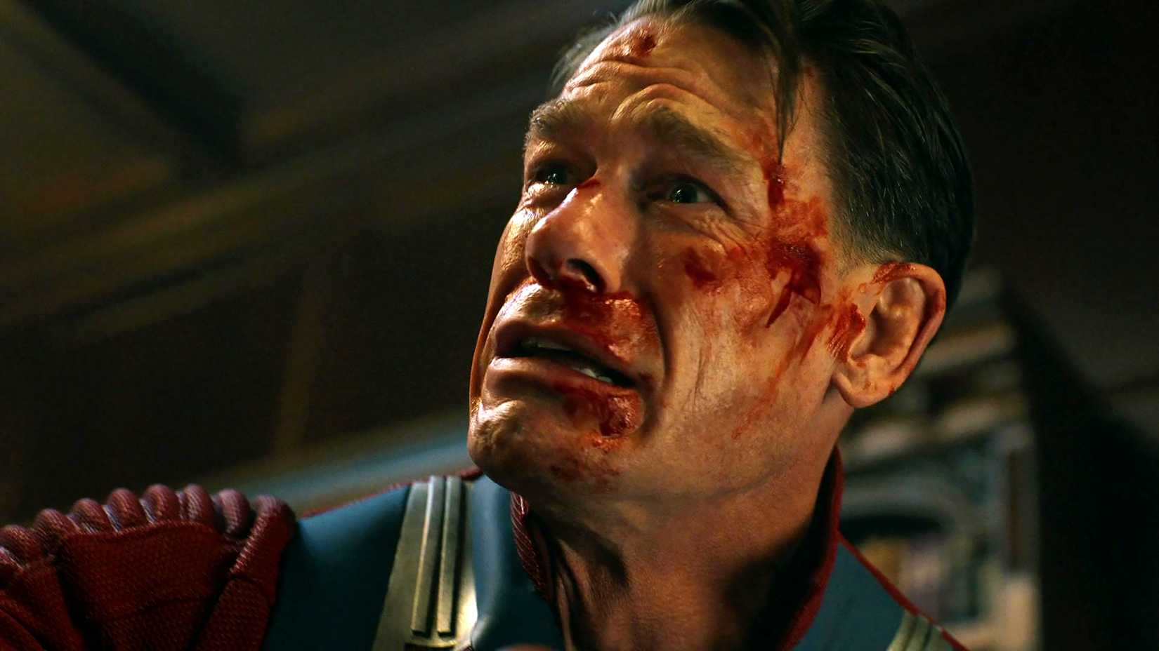 John Cena as Chris smiling with a bloody face in Peacemaker season 2