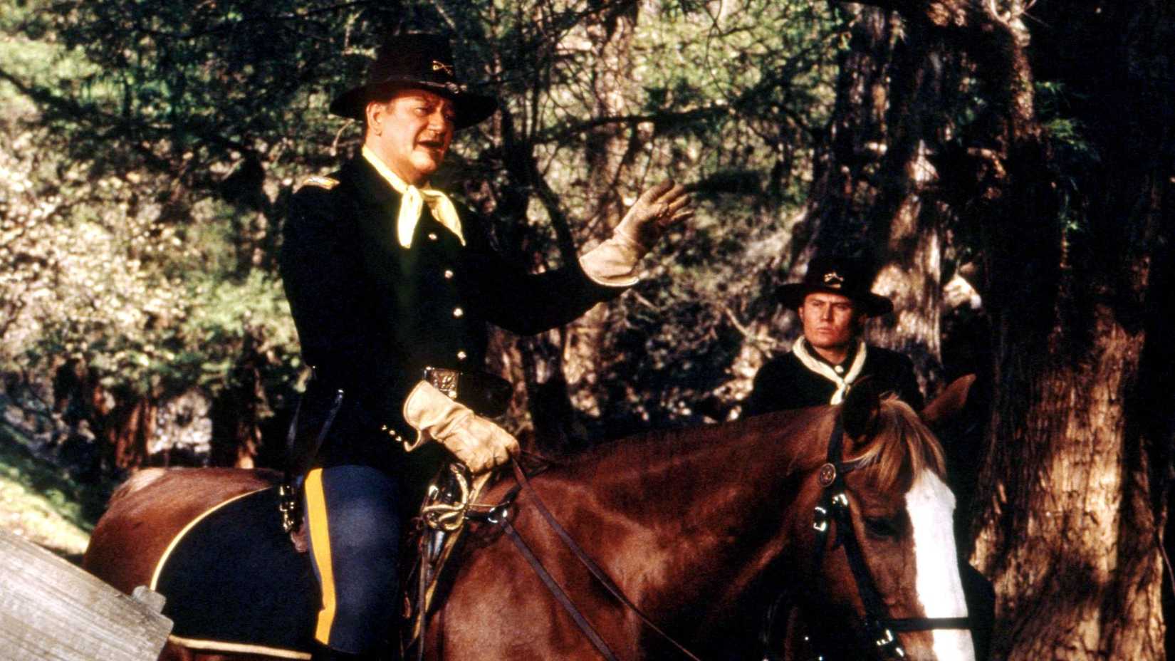 John Wayne cavalgando em Big Jake