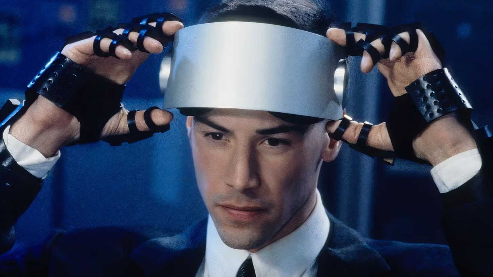 Johnny prepares to put on his VR headset in Johnny Mnemonic