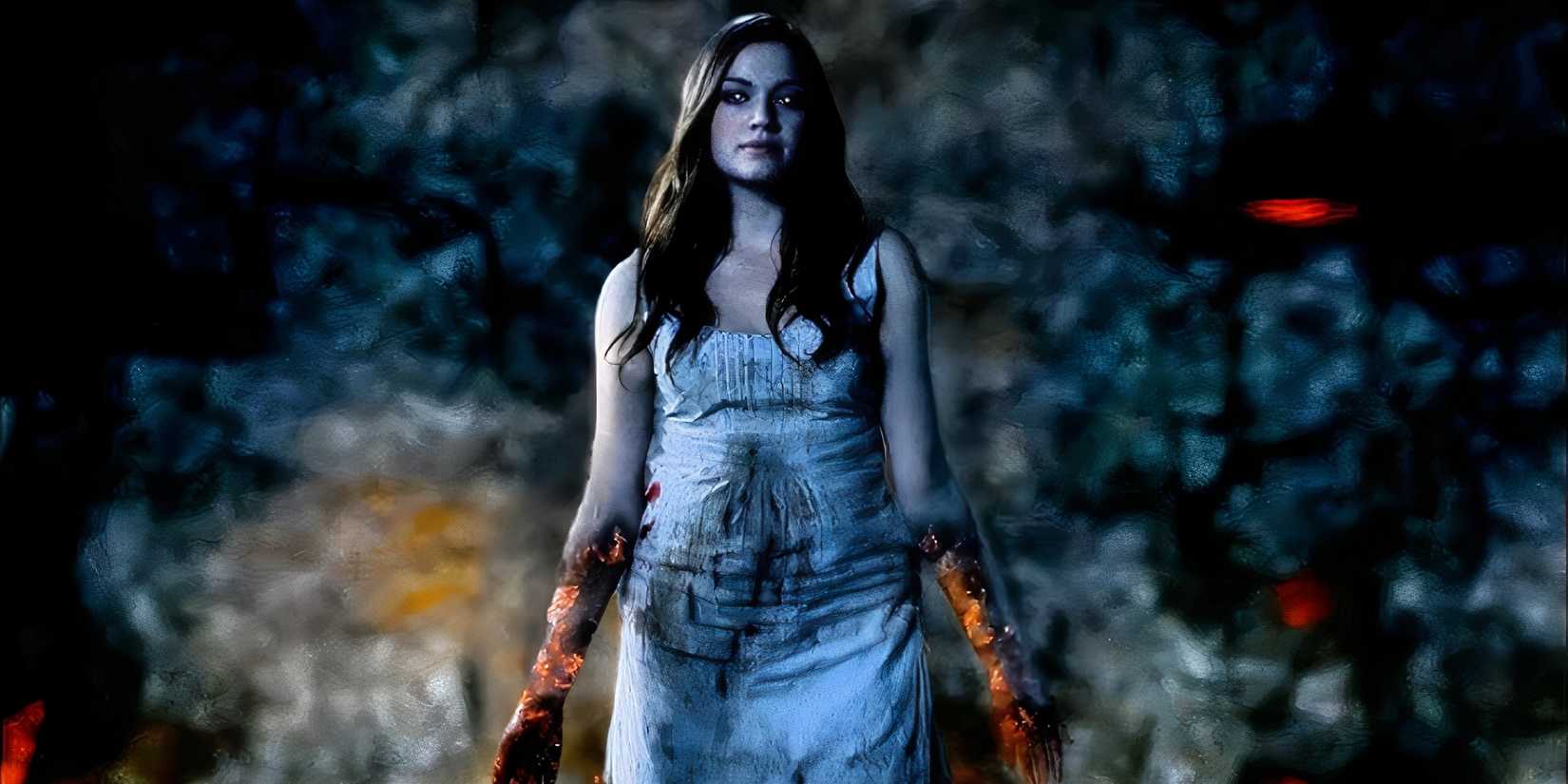 Julia Maxwell as Eve rising from a stony pit in Supernatural.