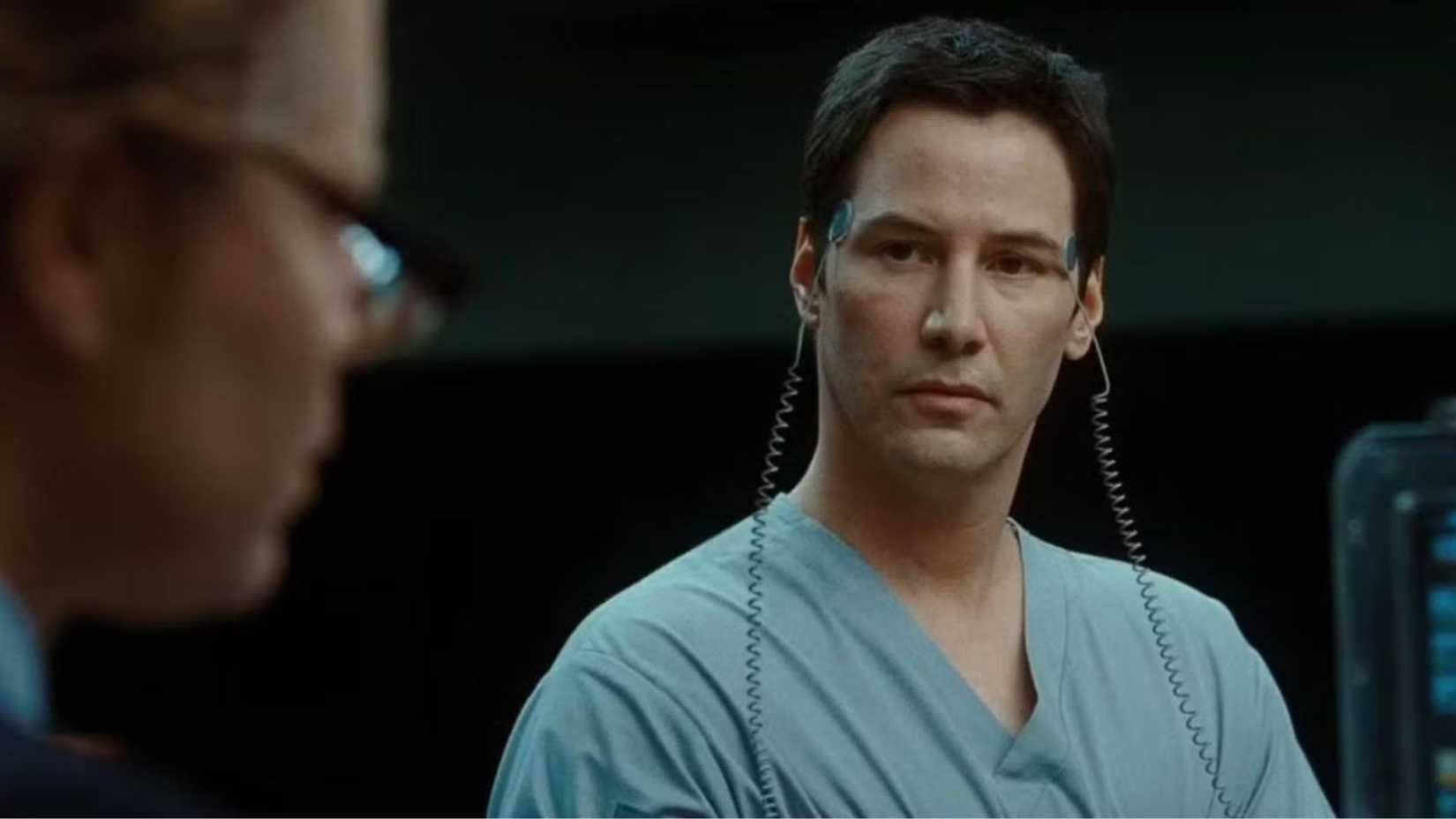 Keanu Reeves as Klaatu being interviewed with nodes on his head in The Day The Earth Stood Still