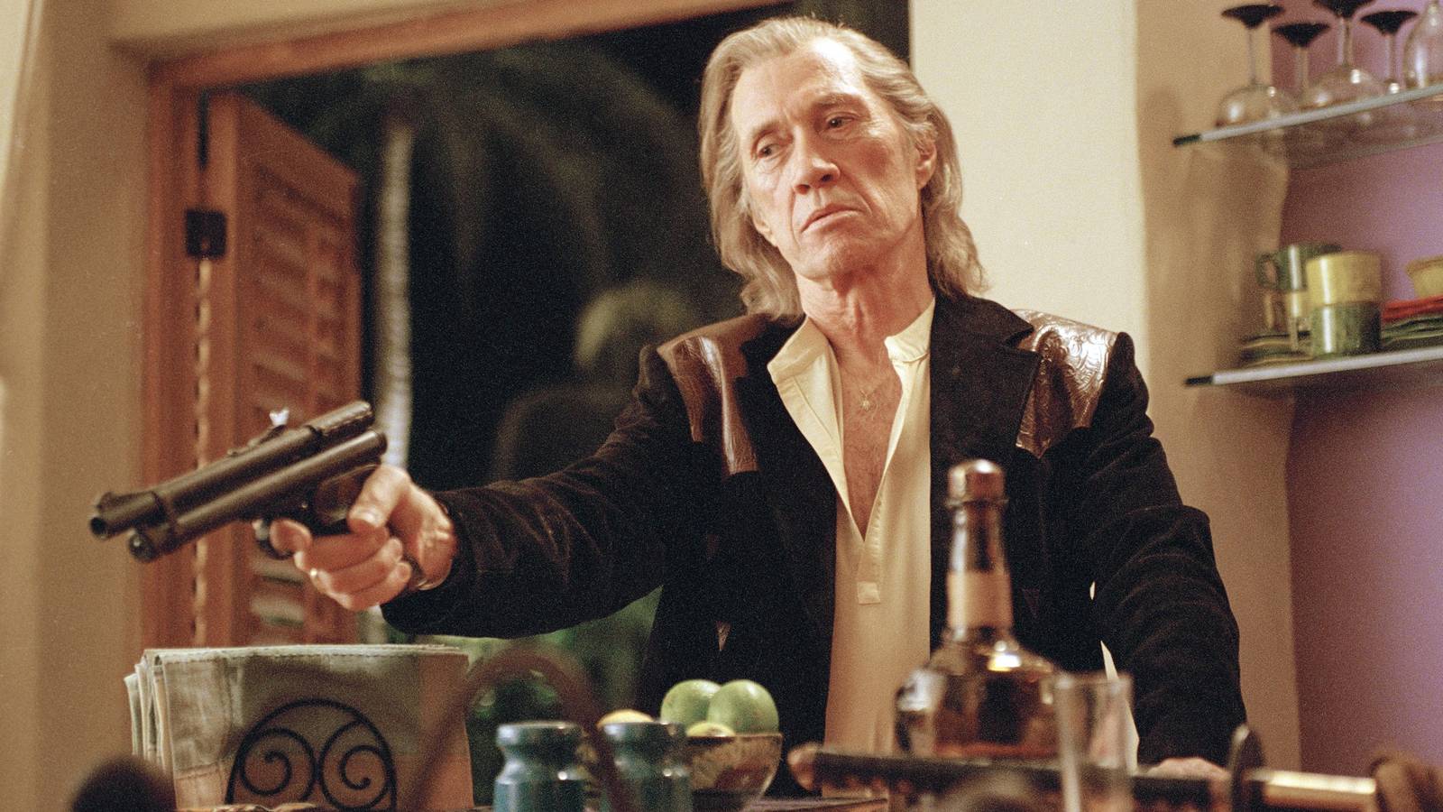 Bill (David Carradine) pointing a gun in Kill Bill Vol. 2