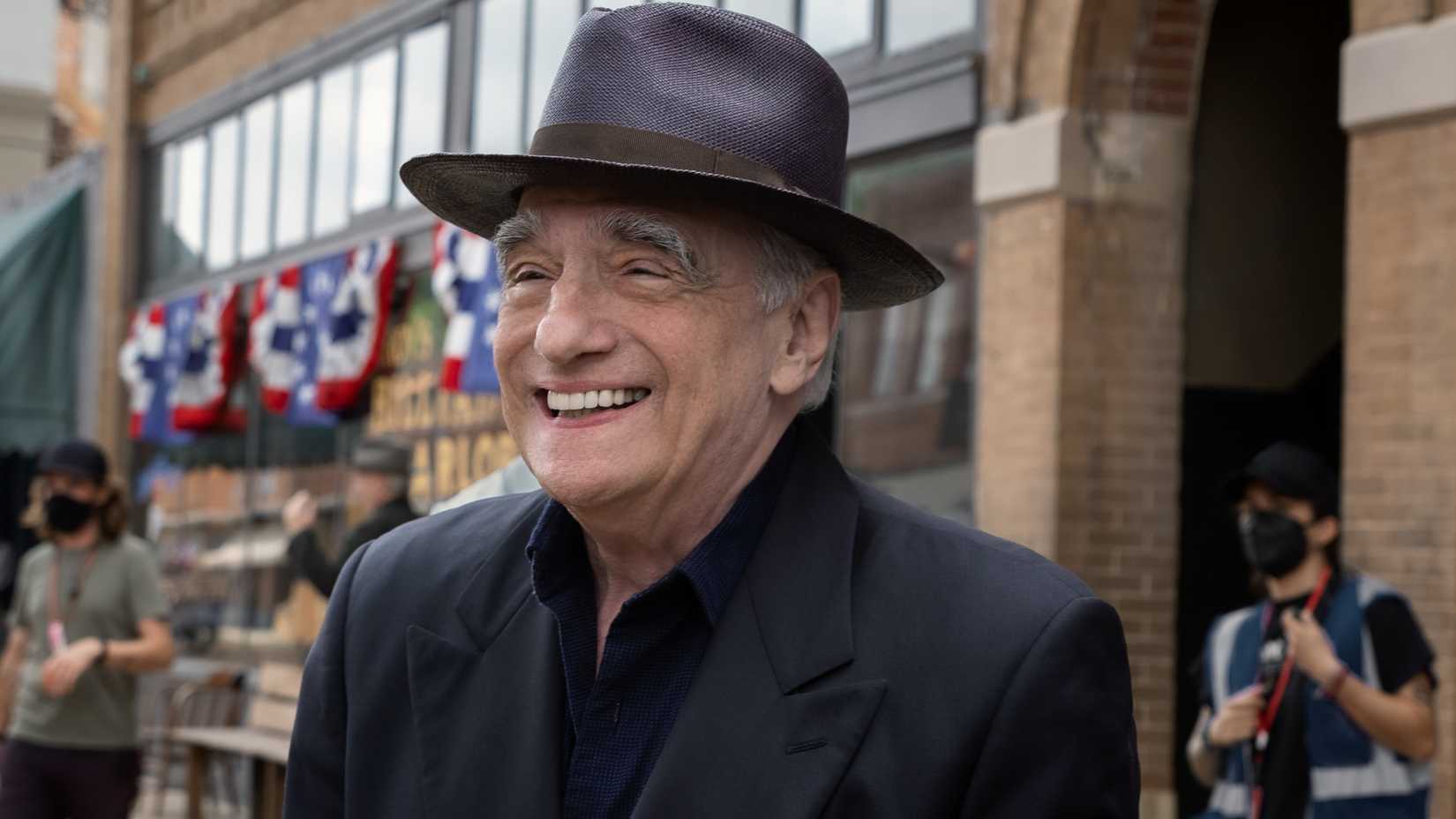 Martin Scorsese smiling behind the scenes of Killers of the Flower Moon