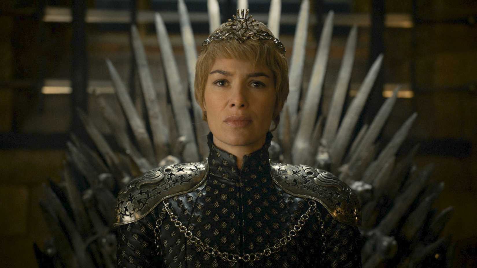 Lena Headey as Cersei Lannister sitting on the Iron Throne in Game of Thrones