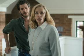 Julia Roberts looking concerned while Andrew Garfield stands behind her in After the Hunt