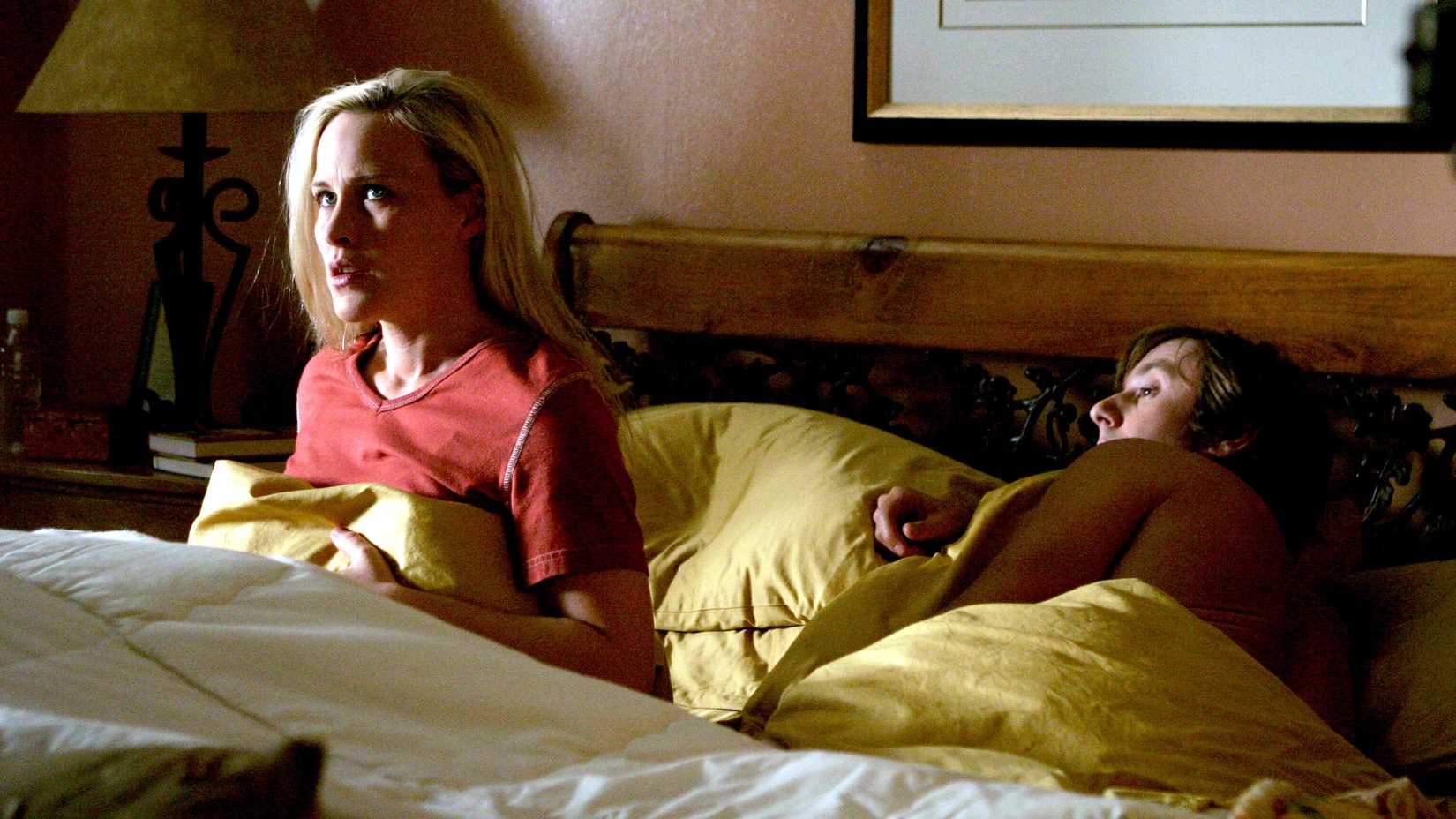 Allison DuBois Sitting Up in Bed Next to Joe in Medium