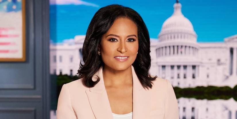 Apresentador do Meet The Press sentado em frente ao Capitólio.