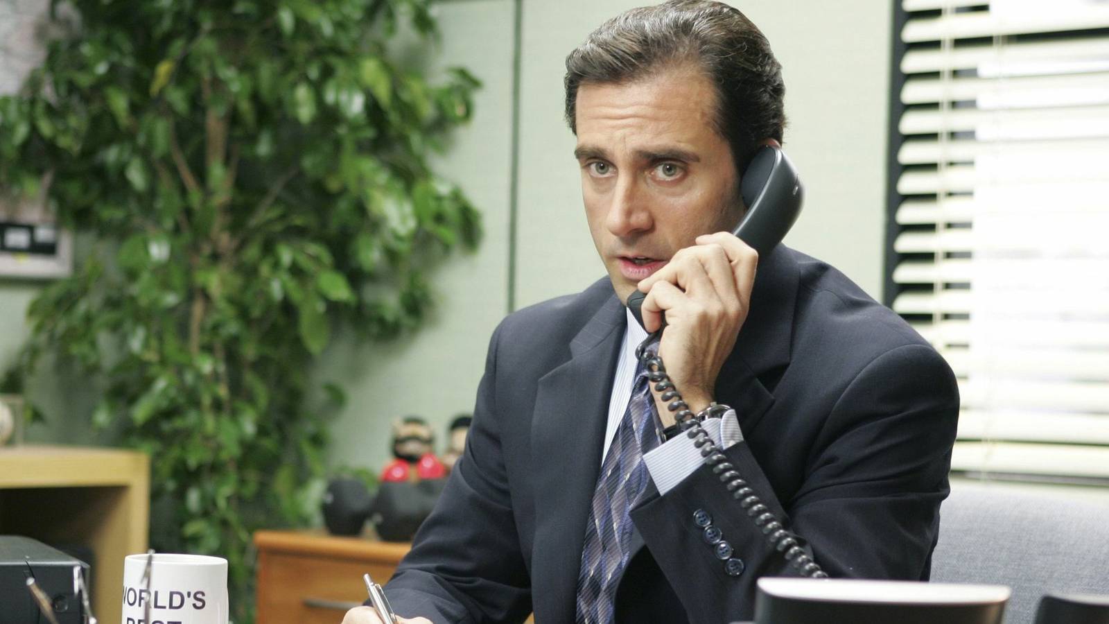 Michael Scott in The Office answering the phone