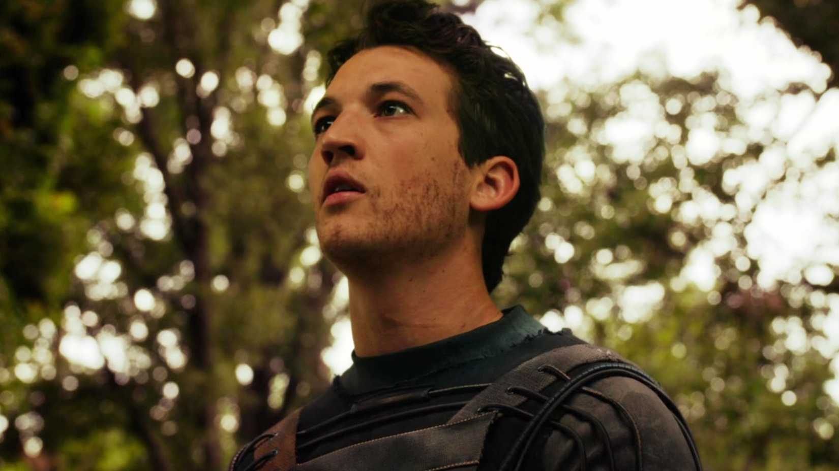 Miles Teller looking up at the sky in Fantastic Four