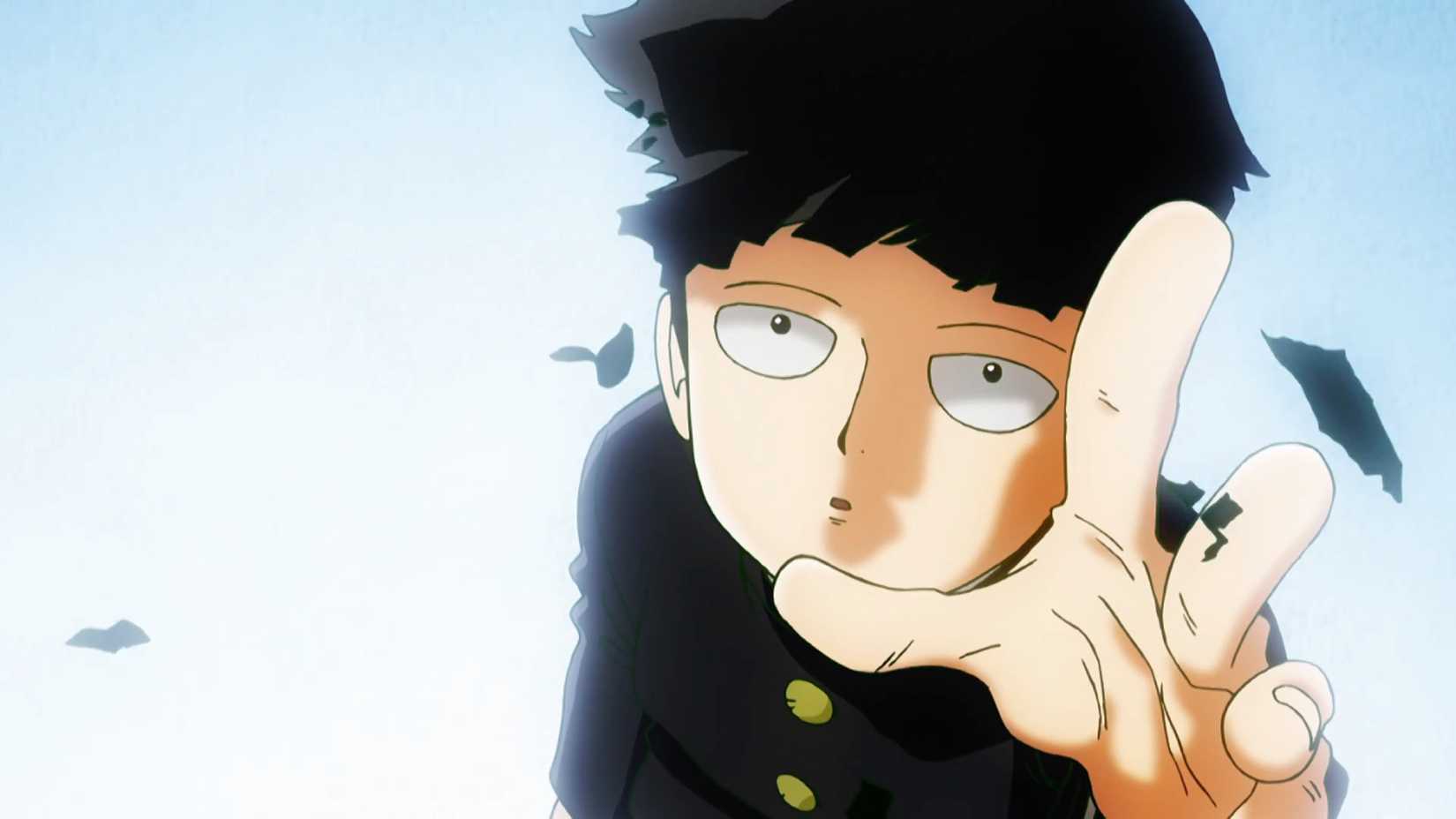 Mob with his hand raised, looking upward in Mob Psycho 100.