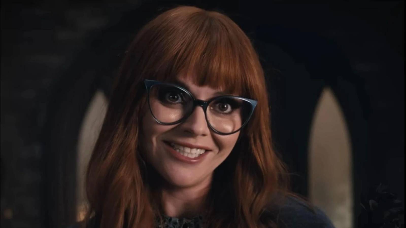 Ms. Marilyn Thornhill (Christina Ricci) smiling broadly in Wednesday.