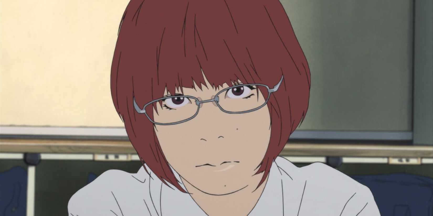 Sawa Nakamura staring forward with a straight look on her face.