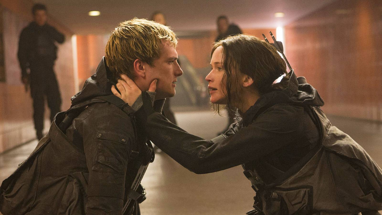 Peeta and Katniss in The Hunger Games: Mockingjay Part 2