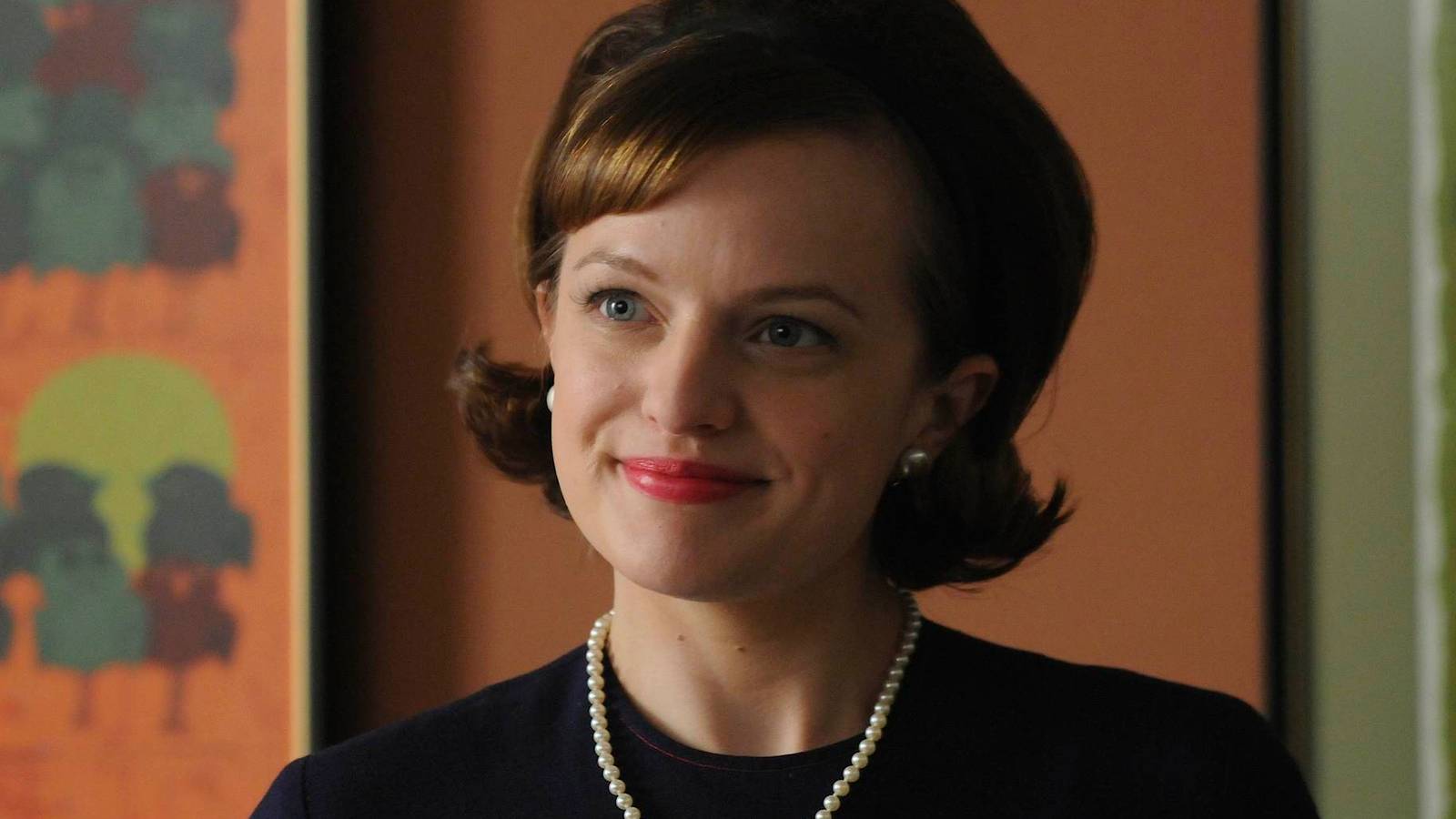 Peggy smiling in Mad Men