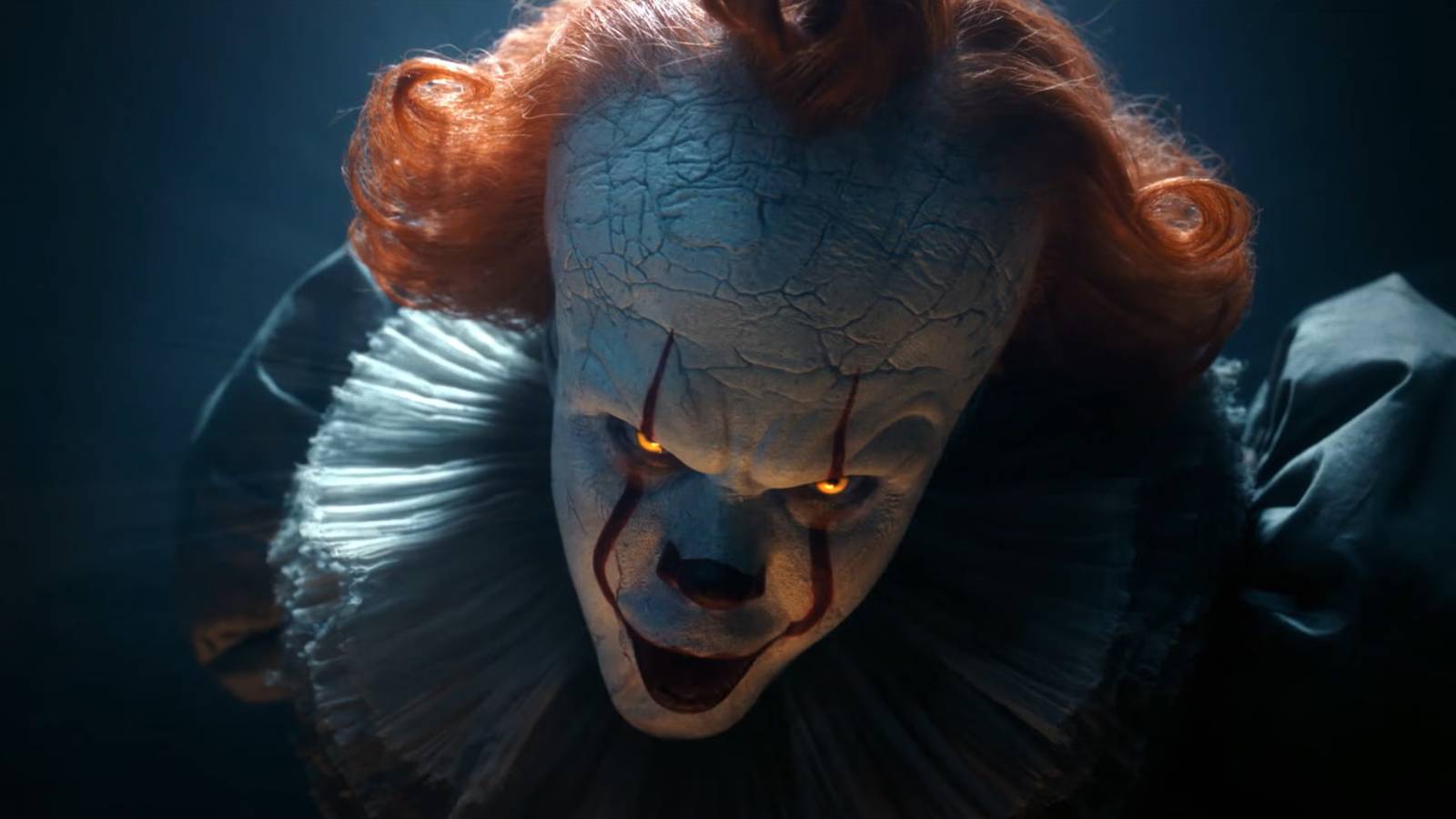 Closeup of Pennywise's face after the big reveal in IT: Welcome to Derry episode 5