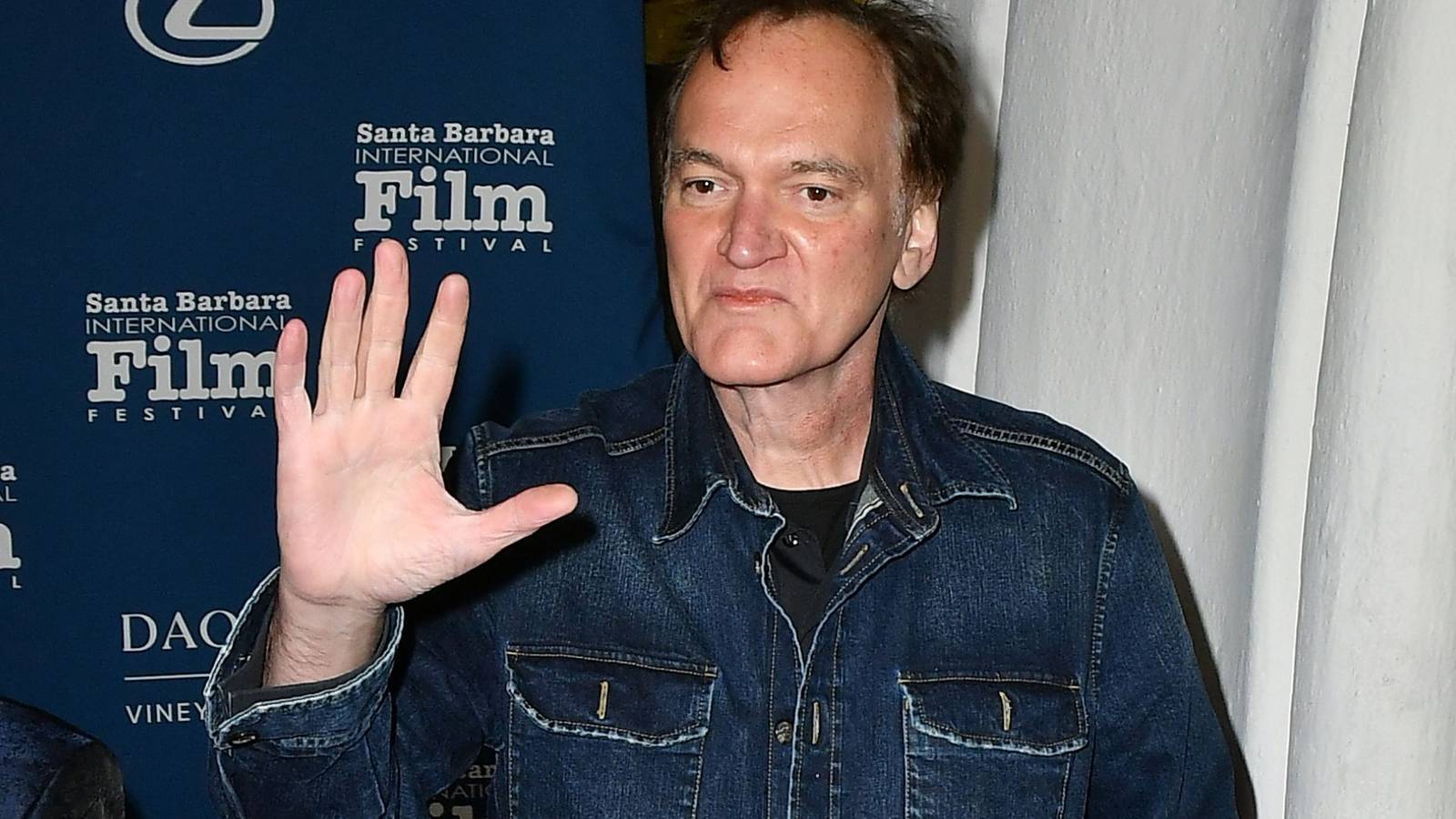 Quentin Tarantino waking to fans