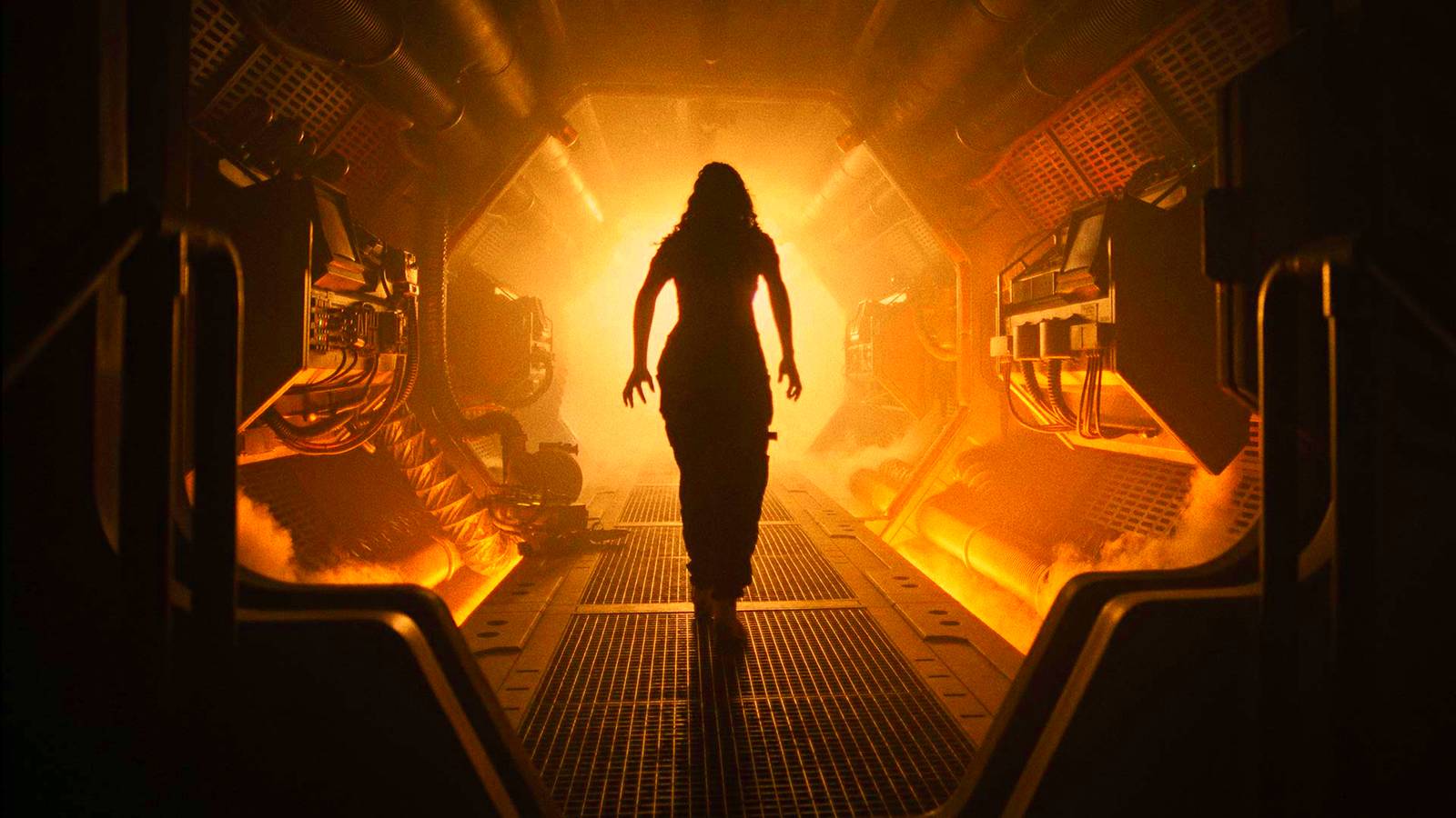 Rain standing in a glowing corridor in Alien Romulus