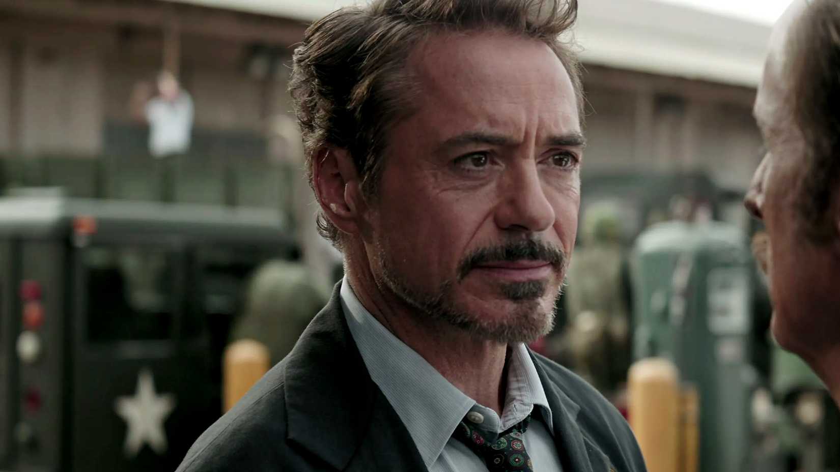 robert downey jr s tony stark looking emotional as he talks to howard stark in avengers endgame