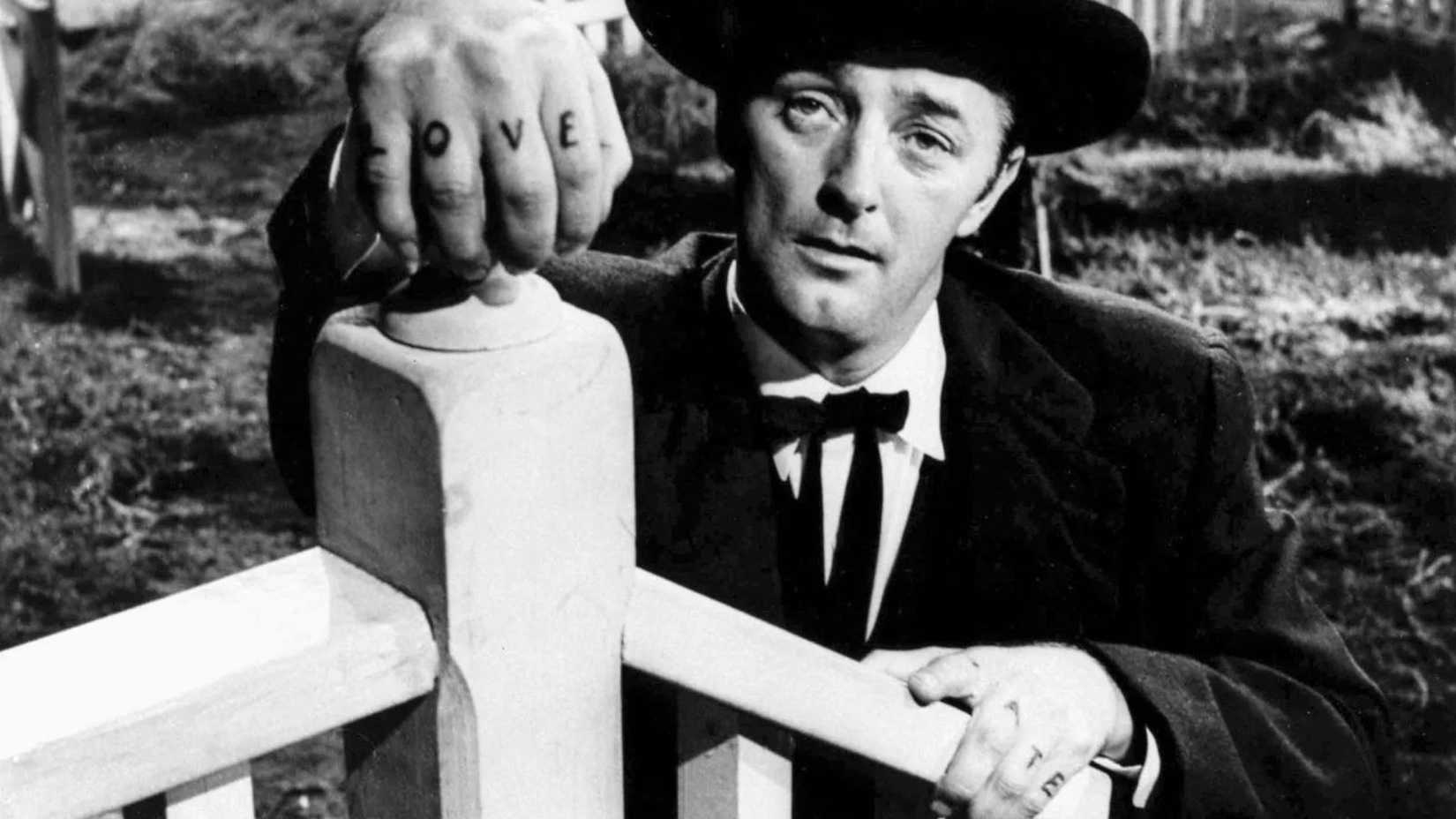 Robert Mitchum as Harry Powell in The Night Of The Hunter
