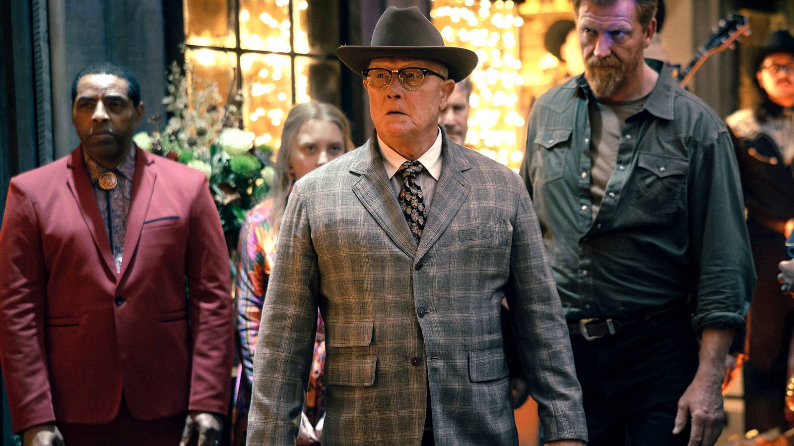 Robert Patrick's Jeremiah Dunmire looking upset standing in front of a group of people in Tulsa King season 3