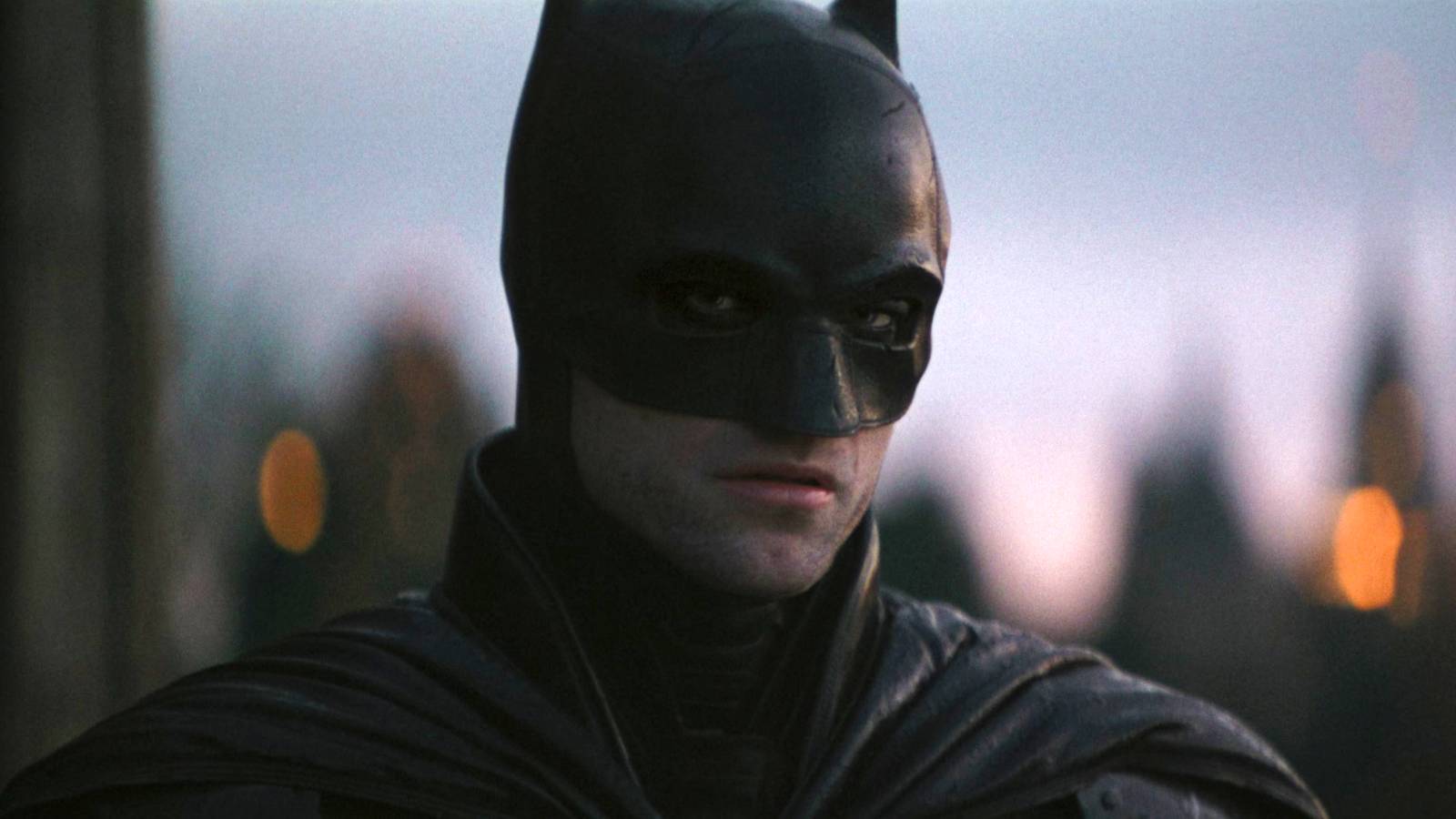 Robert Pattinson's Batman looking at Catwoman at the end of The Batman