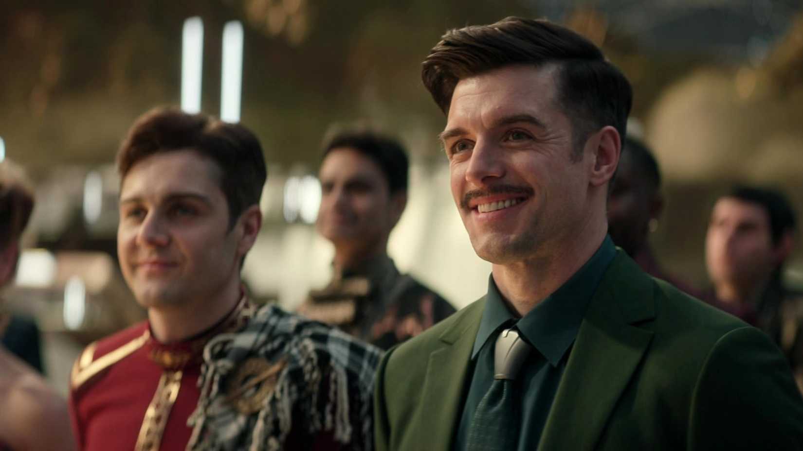 Sam Kirk smiling at wedding