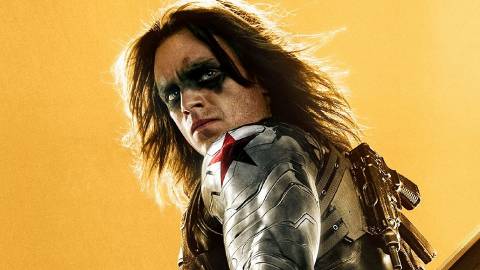 Sebastian Stan's Bucky Barnes looks over his shoulder in his Winter Soldier gear in Marvel's 10-Year celebration yellow background
