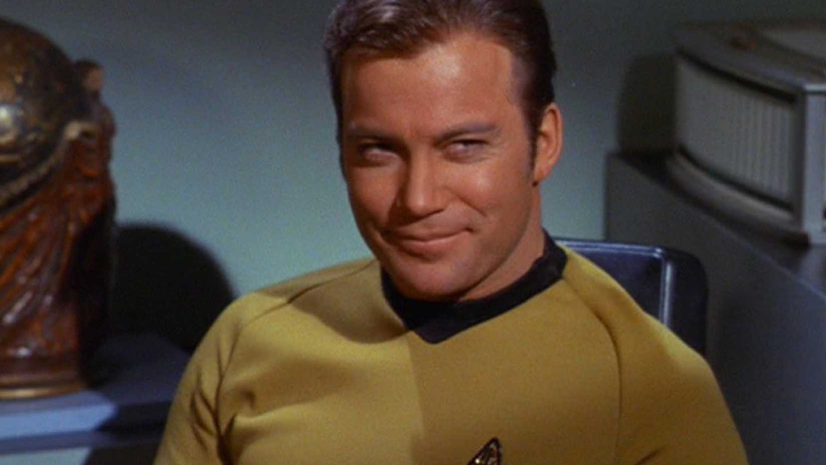 star trek's captain kirk looking smug
