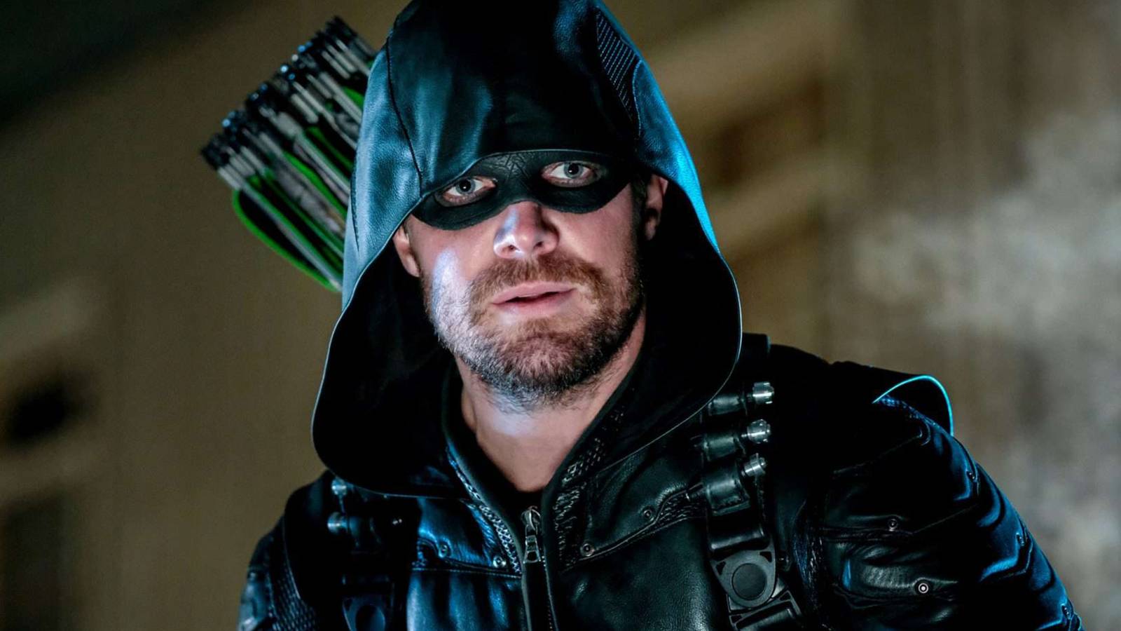 Stephen Amell's Oliver Queen looking shocked in Arrow