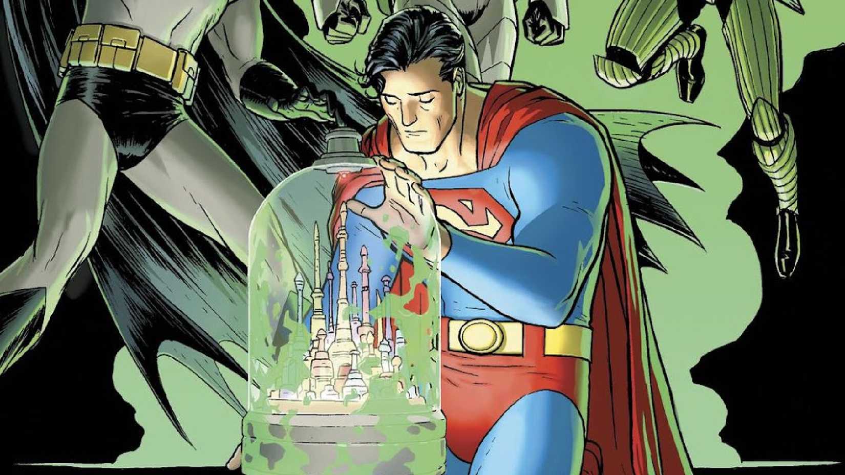 Superman kneels and looks at the Bottled City of Kandor while Batman fights enemies in DC Comics