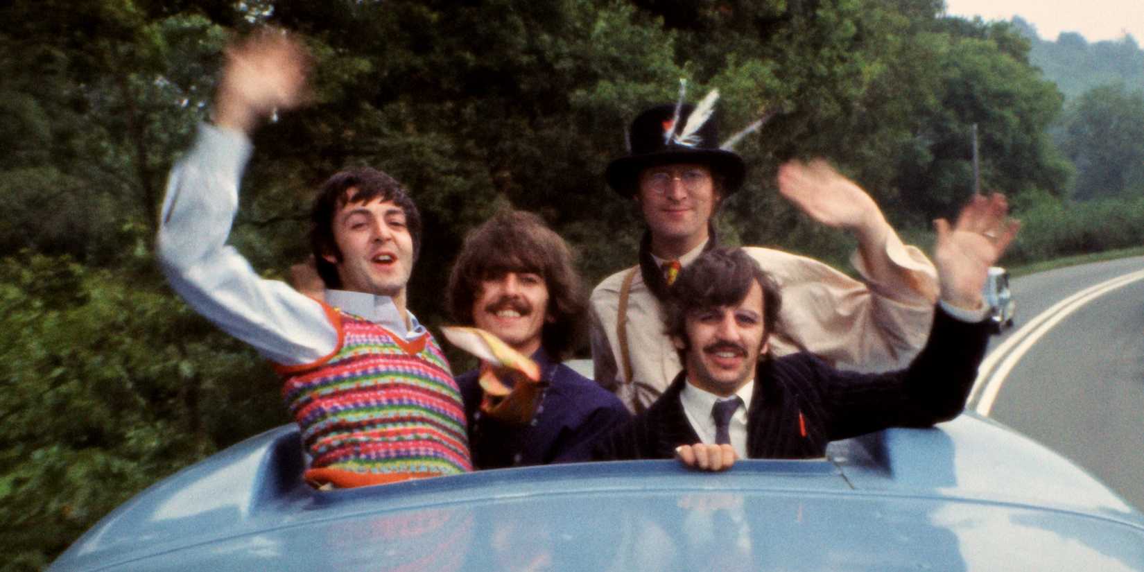 The Beatles waving out of the top of the Magical Mystery Tour bus in The Beatles Anthology 2025