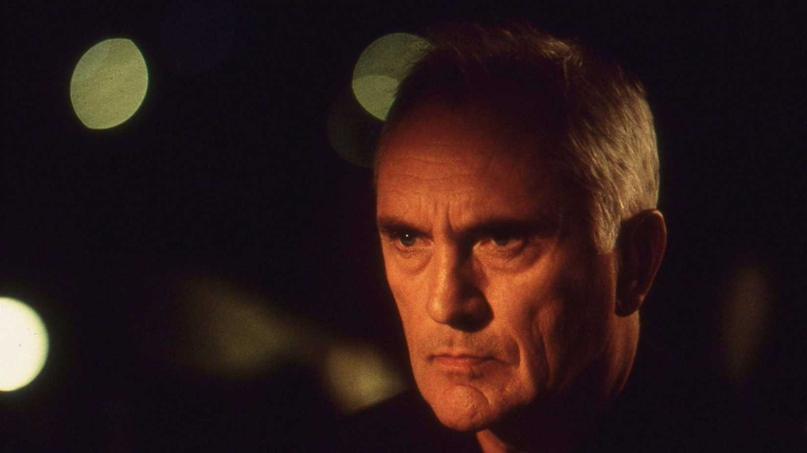 Terence Stamp stares angrily in The Limey
