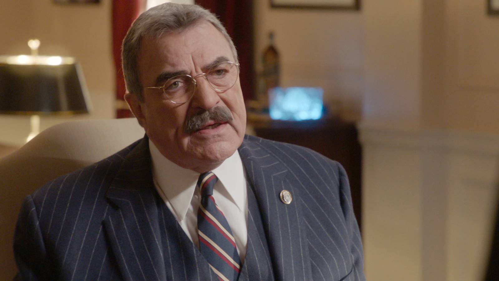 Tom Selleck looking angry as Frank in an episode of Blue Bloods season 14