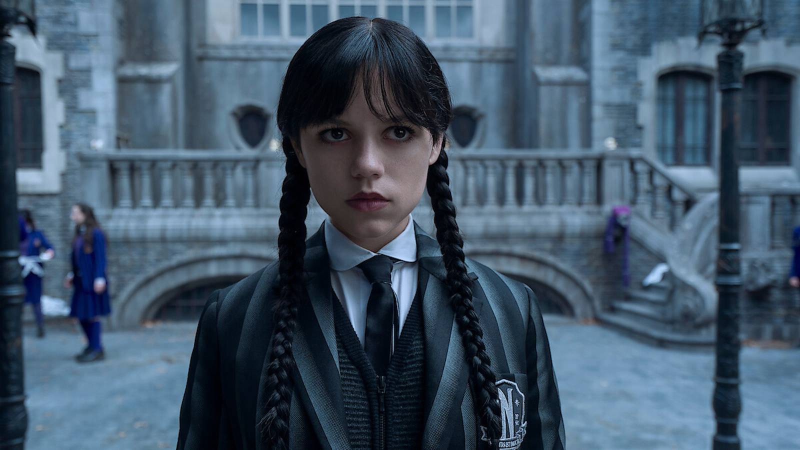 Jenna Ortega looking serious as Wednesday Addams in Wednesday Season 2.