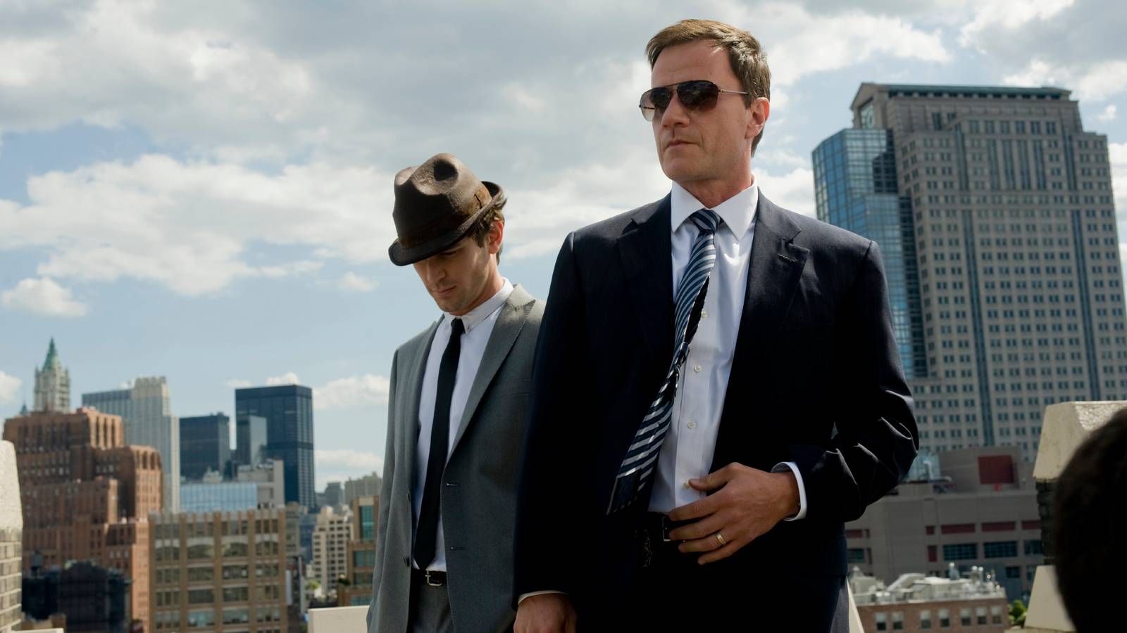 White Collar promo photo featuring Matt Bomer as Neal Caffrey and Tim DeKay as Peter Burke.