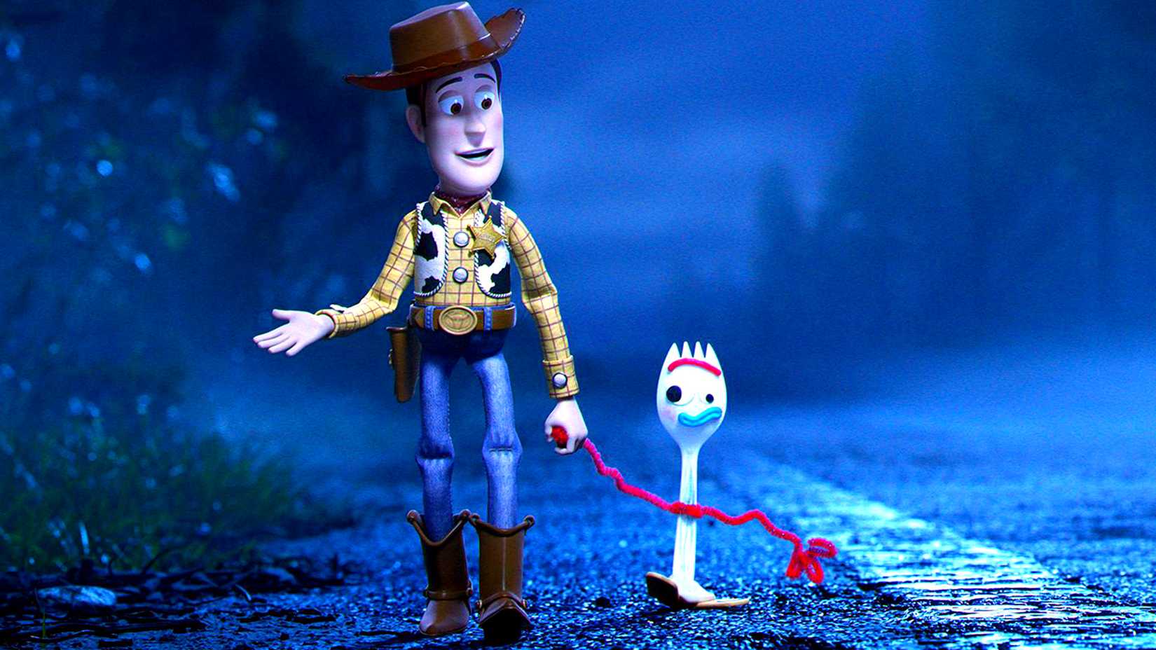 10 Highest Grossing Animated Movies Of All Time At The U.S. Box Office 1 Woody and Forky walking hand in hand in Toy Story 4