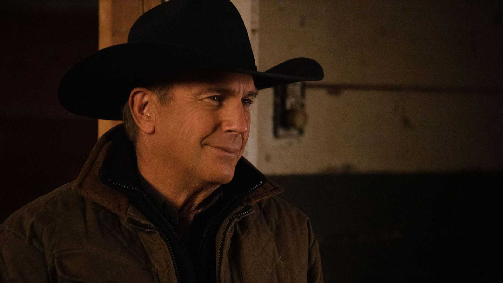 John Dutton III (Kevin Costner) smiling in Yellowstone.