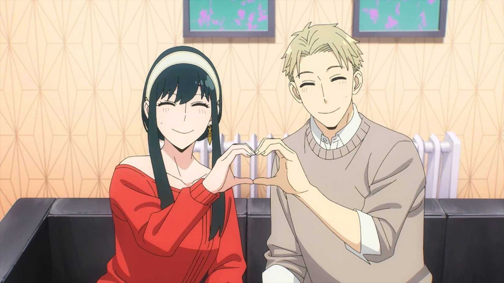Yor and Loid forming a heart shape with their hands in Spy x Family anime