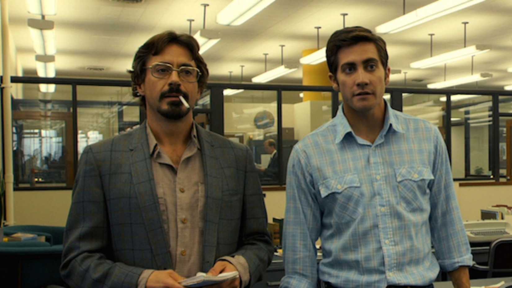 Robert Downey Jr. and Jake Gyllenhaal look on in Zodiac