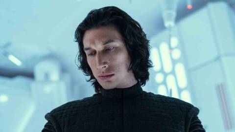 Adam Driver looking down as Kylo Ren/Ben Solo in Star Wars: The Rise of Skywalker