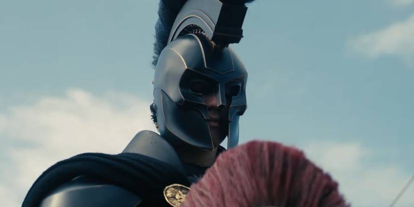 Agamemnon sobre um Odisseu ajoelhado em The Odyssey.