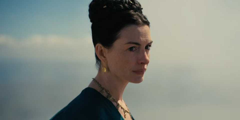Anne Hathaway giving a concerned look in close-up as Penelope in The Odyssey