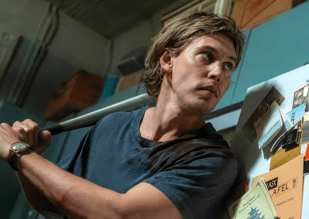 Austin Butler with baseball bat in Caught Stealing