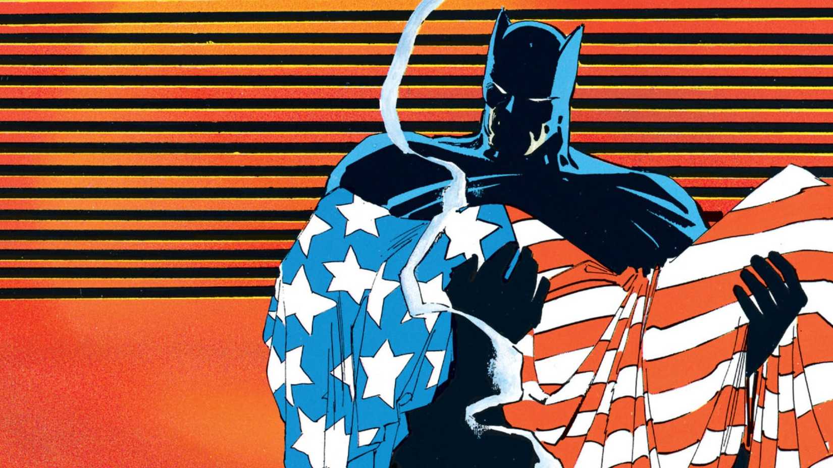 Batman cradling a dead body draped in the American flag.