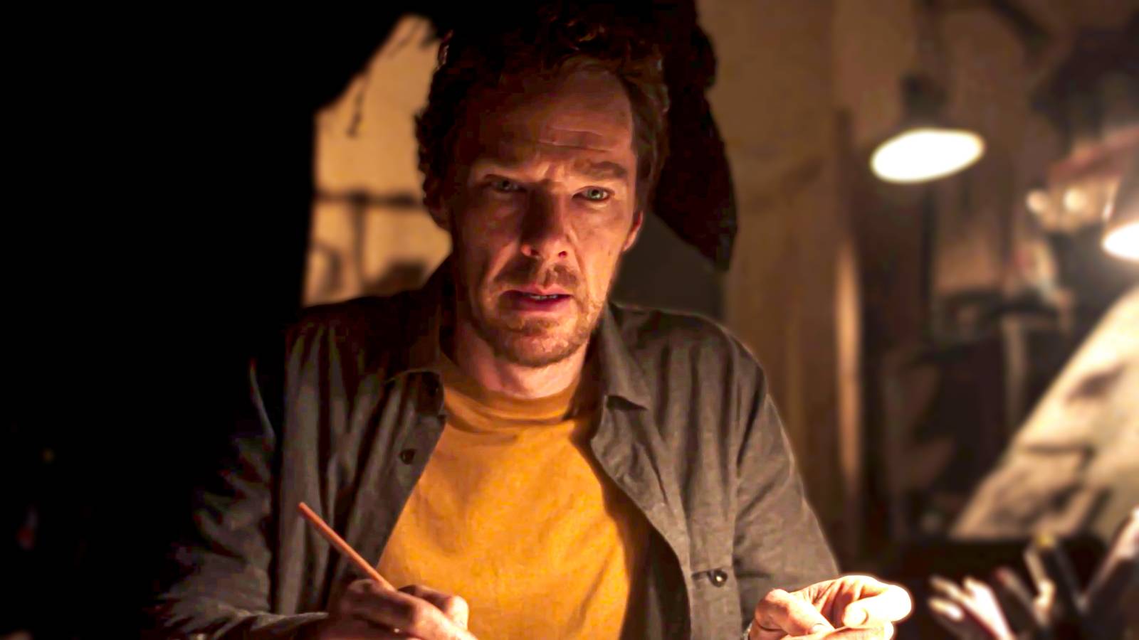 Benedict Cumberbatch's Dad looking shocked while sitting at his desk and Crow looming behind him in The Thing with Feathers