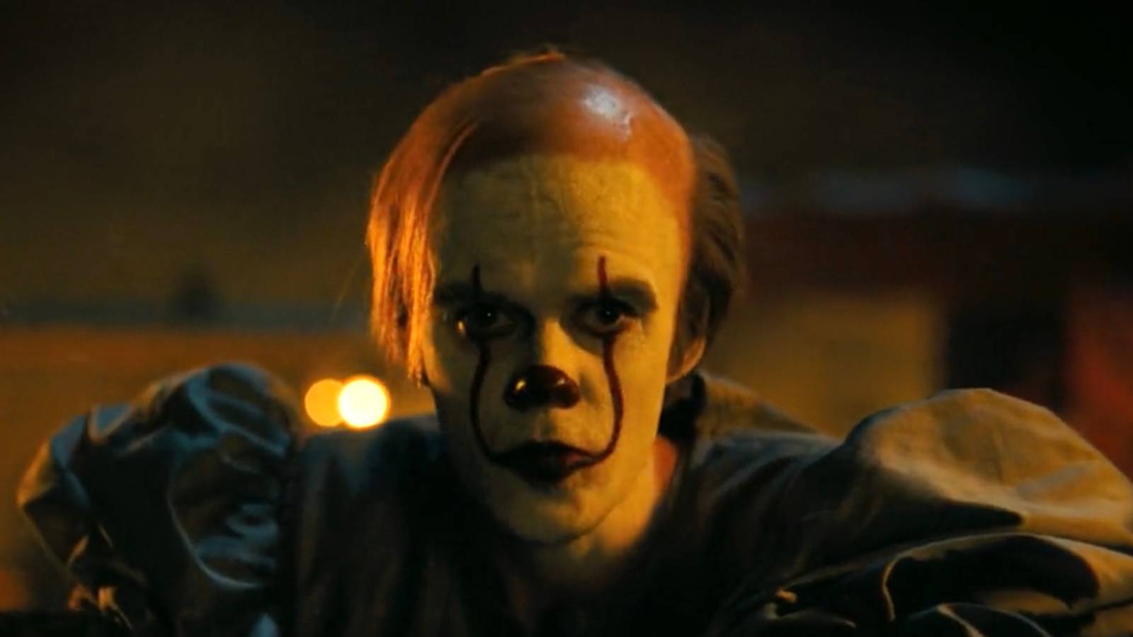 Bill Skarsgard's Bob Gray stares at the camera in It Welcome to Derry
