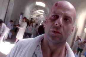 Bruce Willis' James Cole looking confused while in a mental institution in 12 Monkeys
