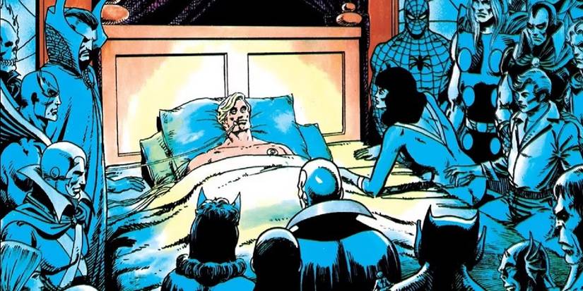 Captain Marvel on his death bed surrounded by Marvel heroes