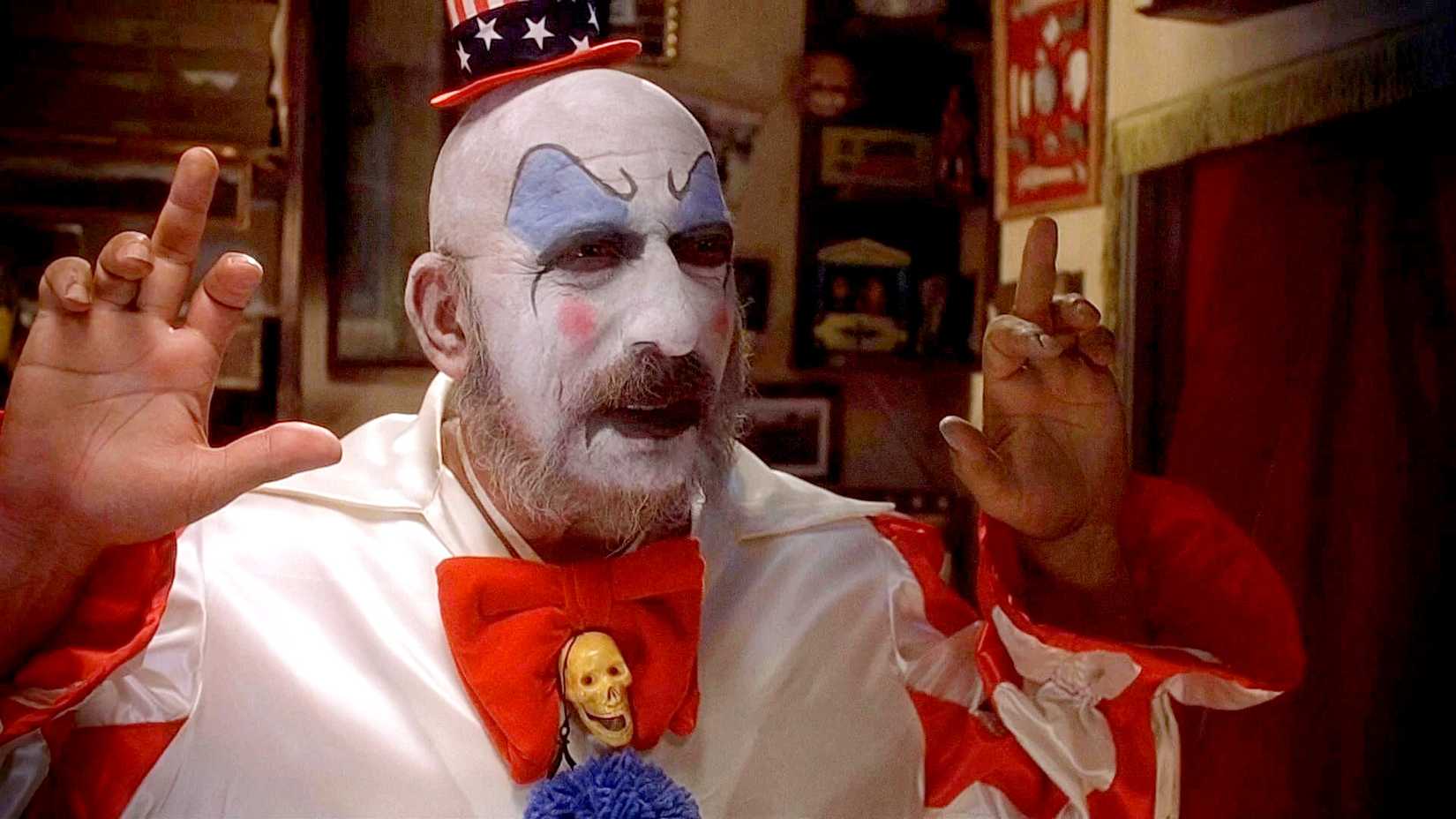 Captain Spaulding with his hands up in House of 1000 Corpses